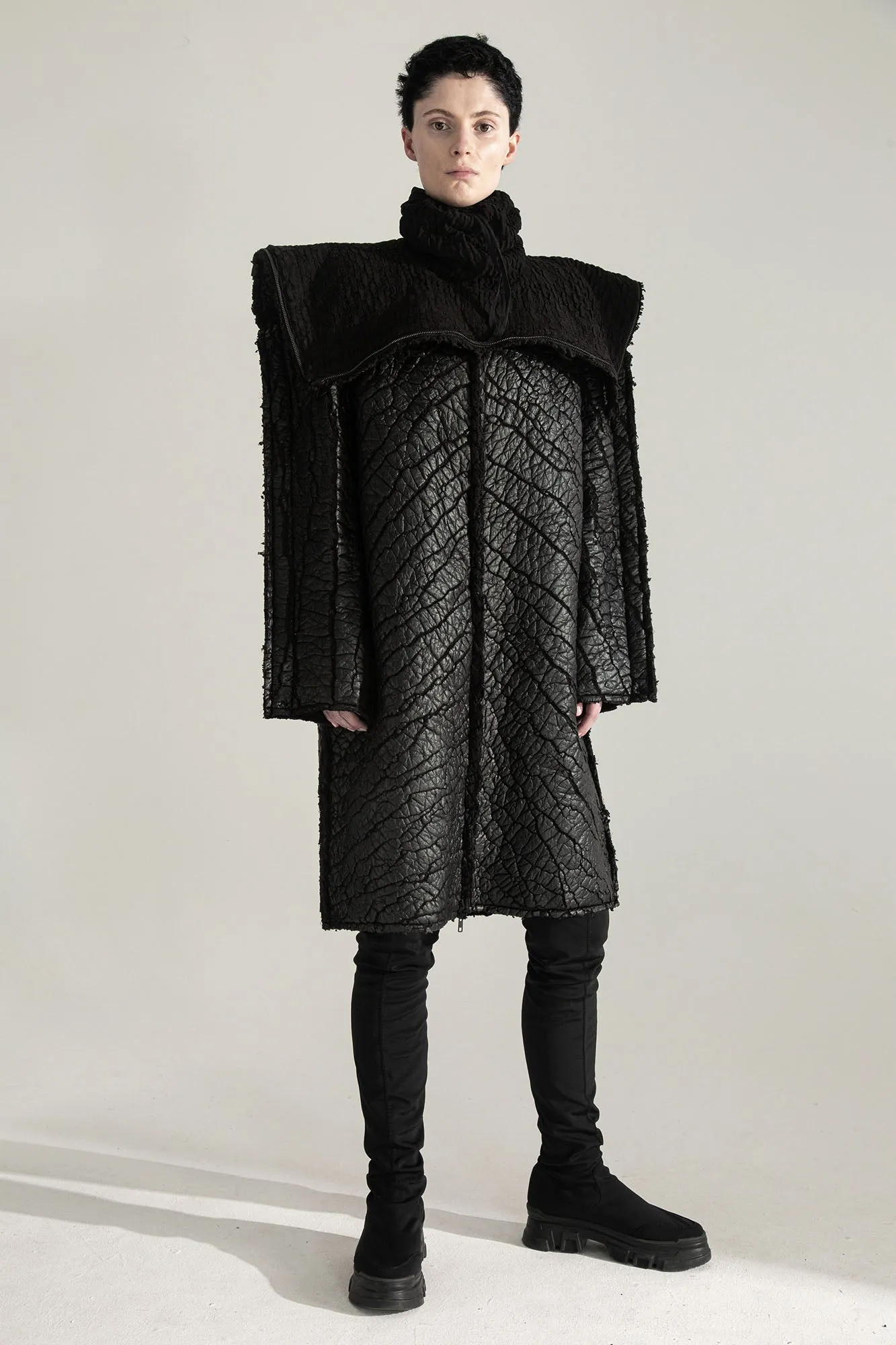 SURVIVOR 2-way transforming piece: coat / hat / bag / vest