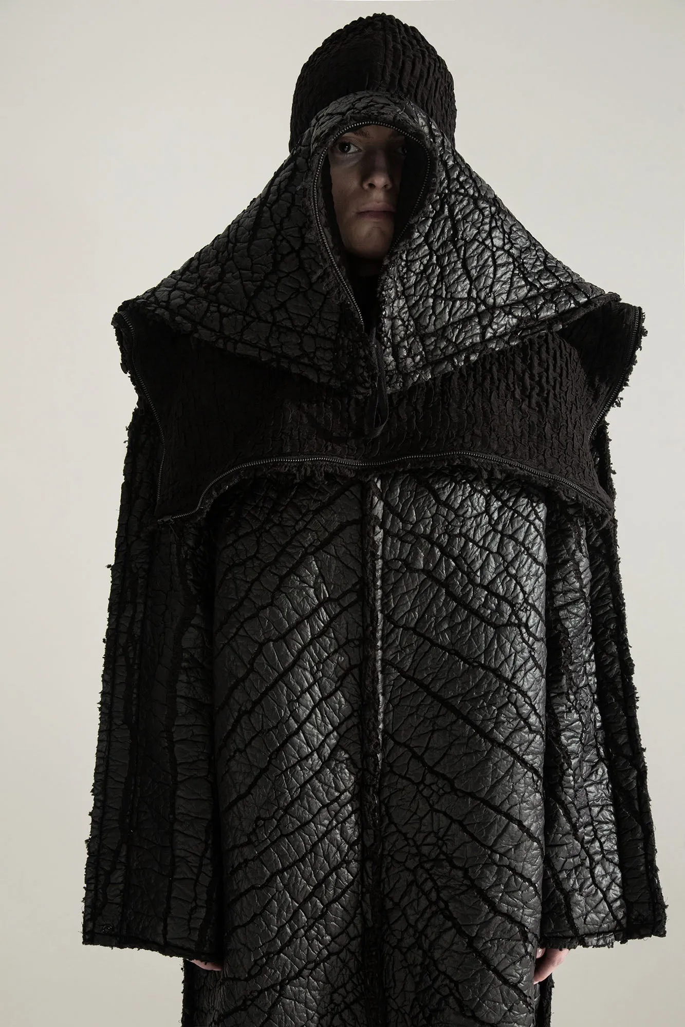SURVIVOR 2-way transforming piece: coat / hat / bag / vest