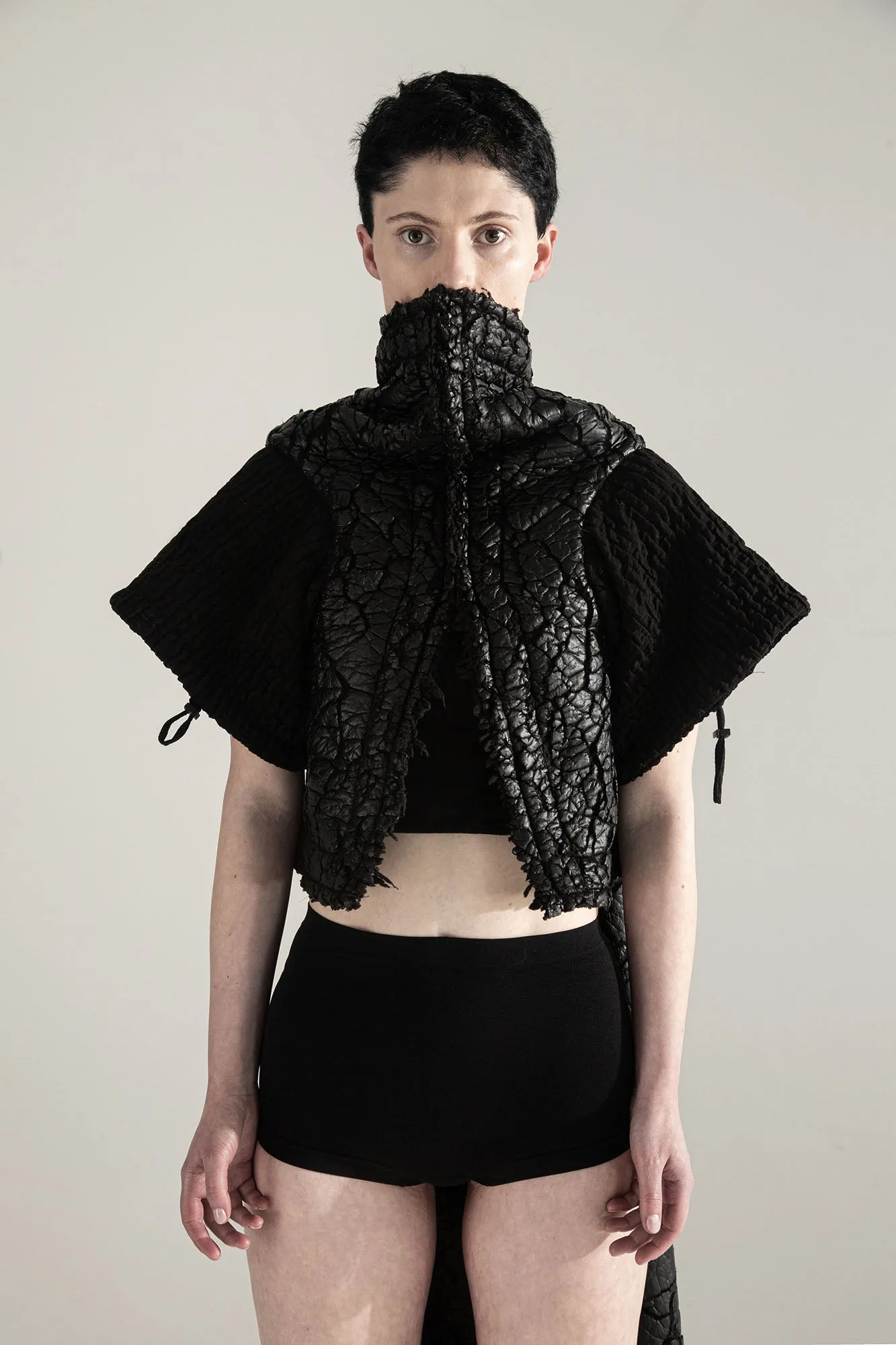 SURVIVOR 2-way transforming piece: coat / hat / bag / vest