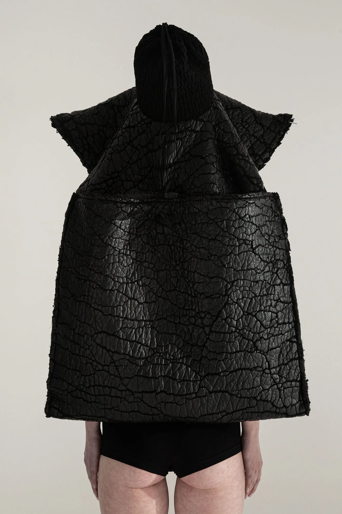 SURVIVOR 2-way transforming piece: coat / hat / bag / vest