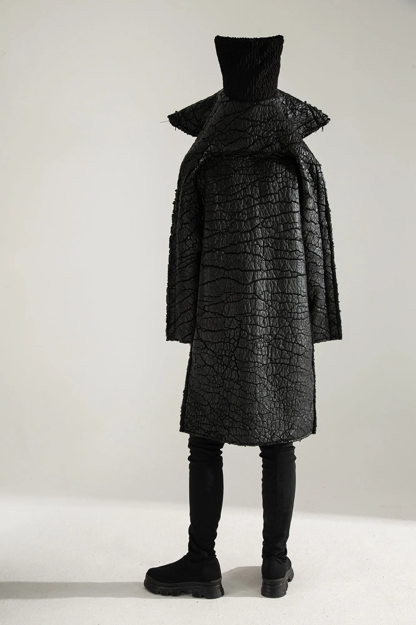 SURVIVOR 2-way transforming piece: coat / hat / bag / vest