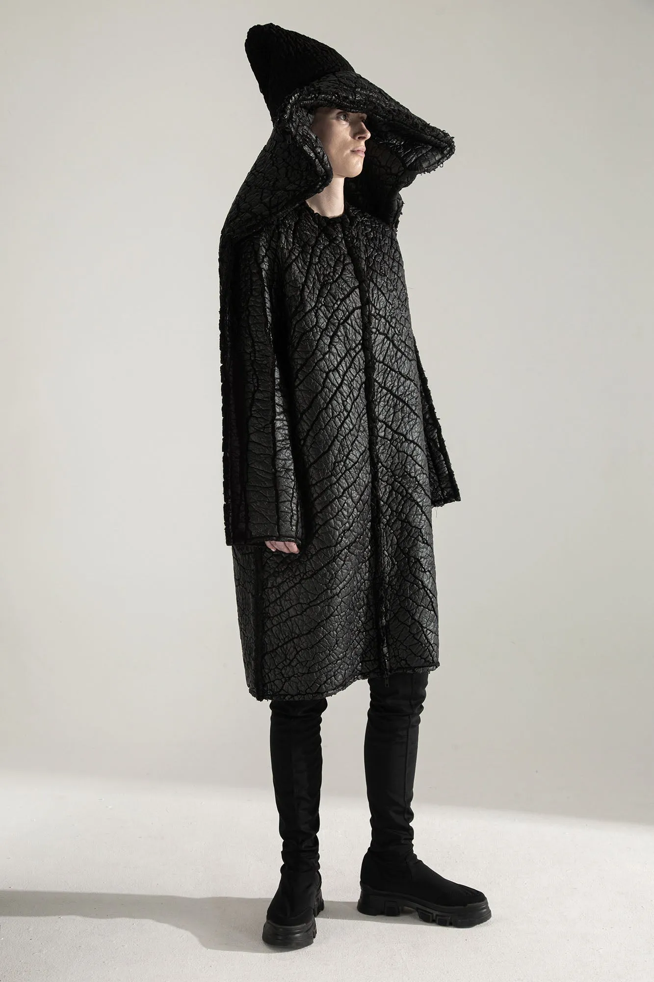 SURVIVOR 2-way transforming piece: coat / hat / bag / vest