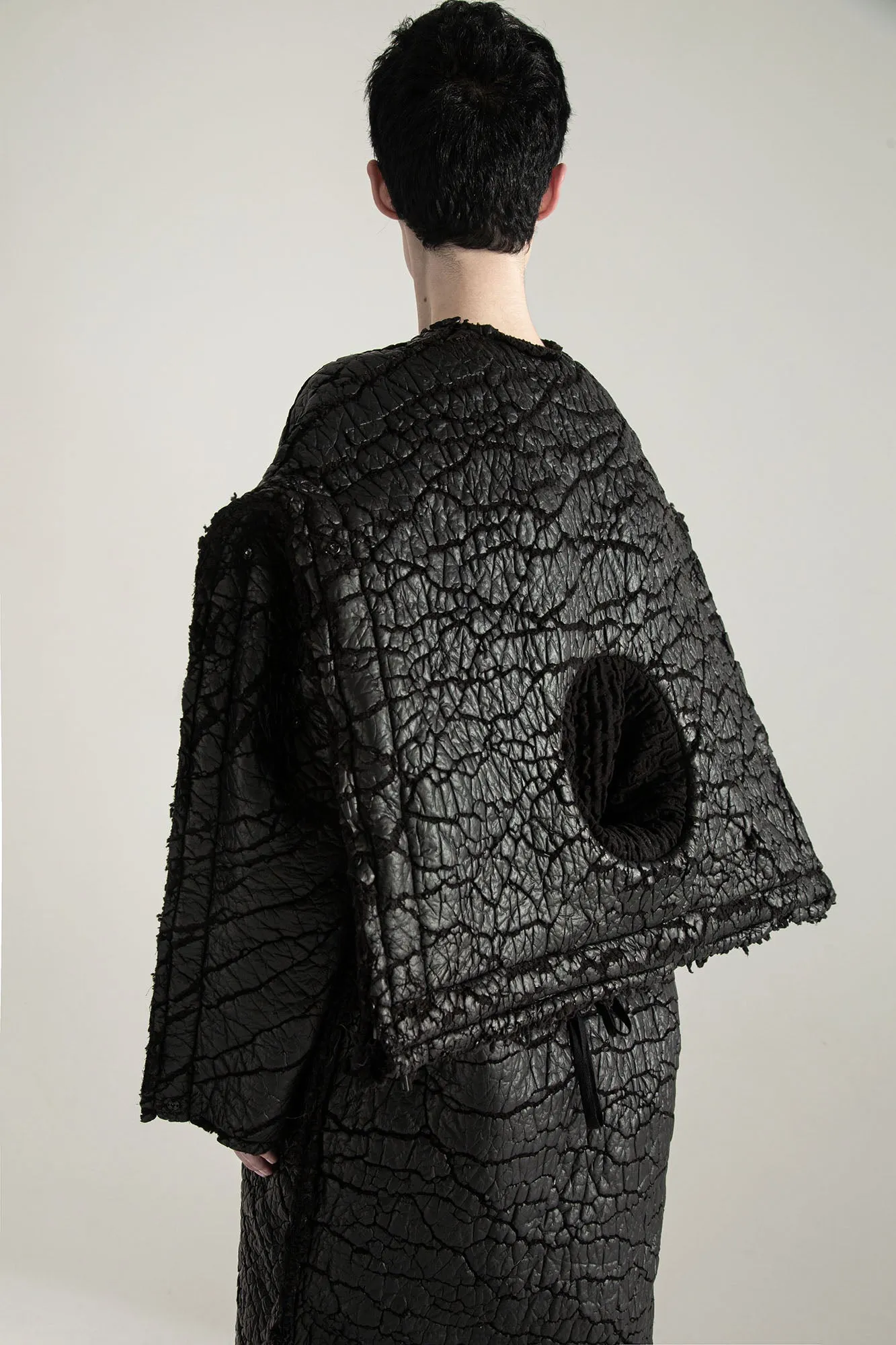 SURVIVOR 2-way transforming piece: coat / hat / bag / vest