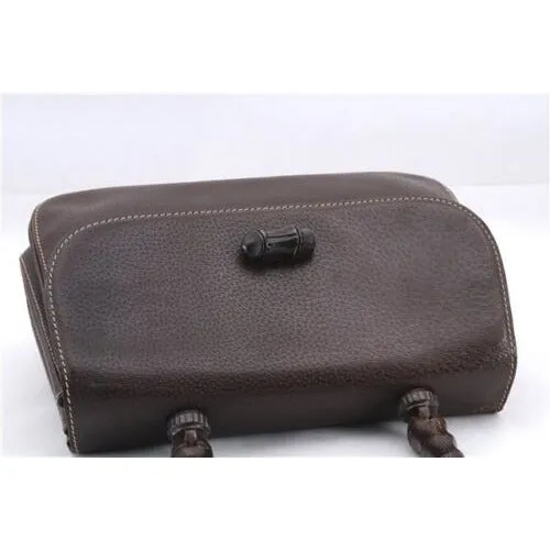 Vintage Gucci boarskin leather top handle Kelly style purse with bamboo look accents and carved wood handle