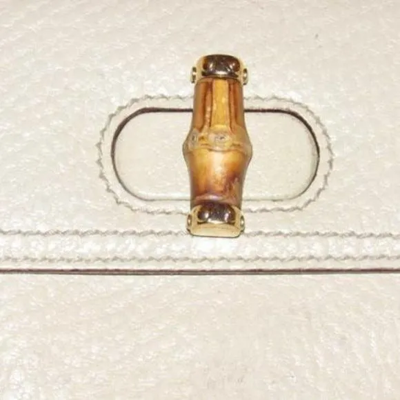 Vintage Gucci Ivory Pebbled Bi-fold Bamboo Accent